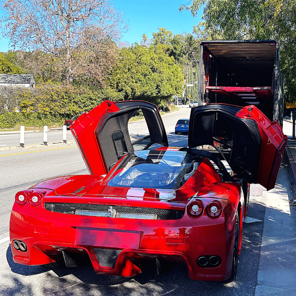 Ferrari loading onto Liftgate Luxury Exotic Auto Transport Coast to Coast