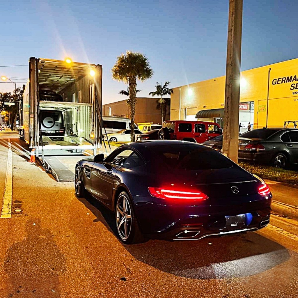 Mercedes Benz loading on enclosed carrier luxury auto transport